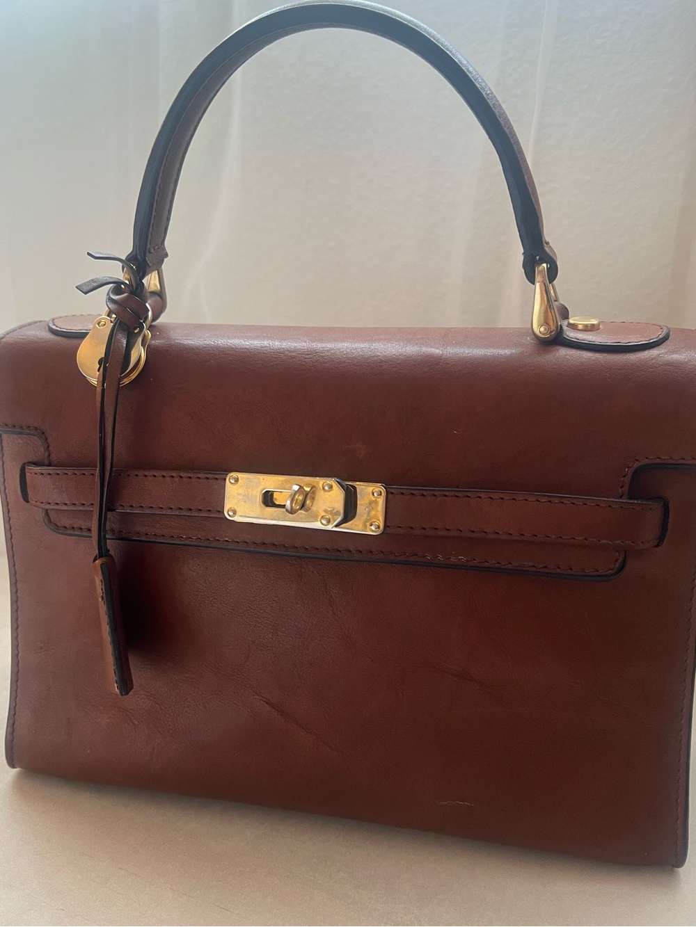 Vintage genuine leather gold/tan Kelly style bag